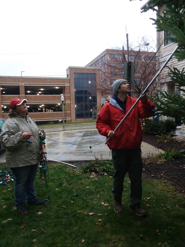 Volunteering to Set Up Lights Display at Ronald McDonald House